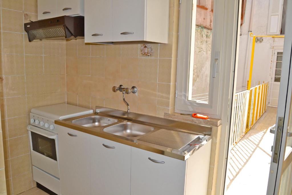 Kuchyň nebo kuchyňský kout v ubytování Maridea - Corso Umberto
