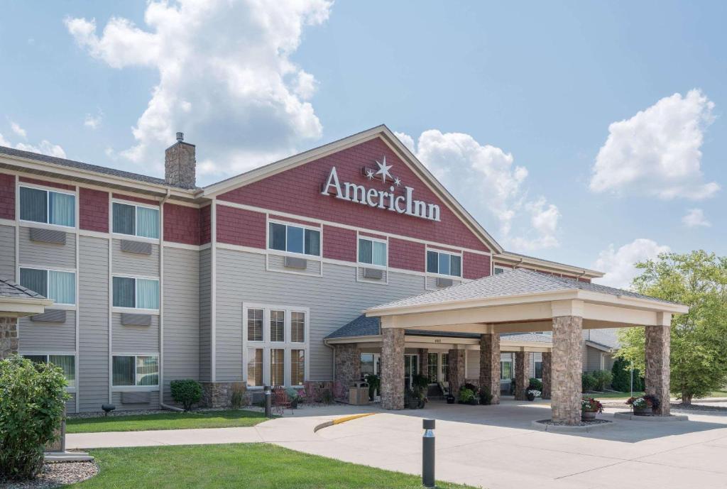 a rendering of an american inn at AmericInn by Wyndham Newton in Newton