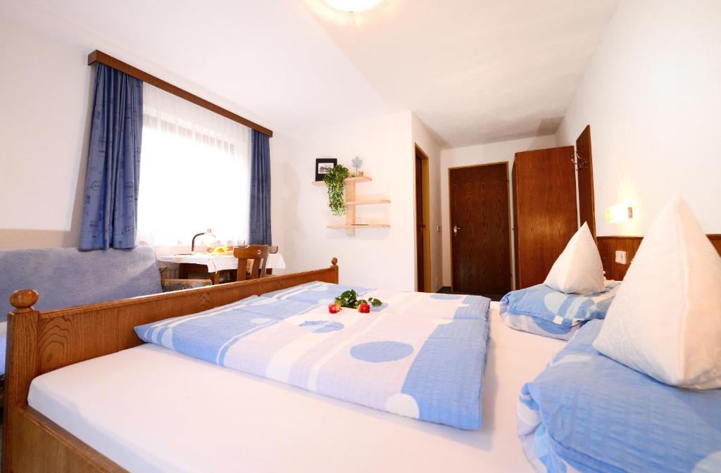 Postel nebo postele na pokoji v ubytování Haus Renate
