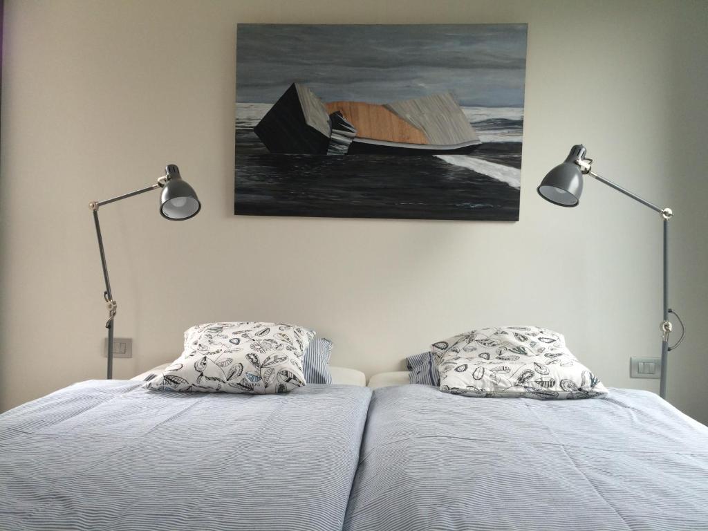 Postel nebo postele na pokoji v ubytování La Chambre d'Amis