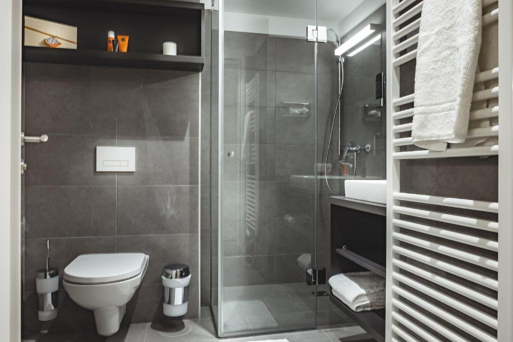 Koupelna v ubytování Oliver Apartments | contactless check-in
