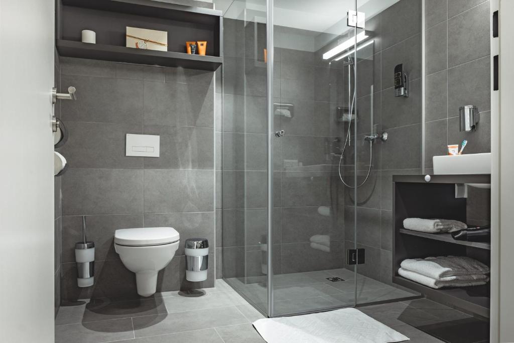 Koupelna v ubytování Oliver Apartments | contactless check-in