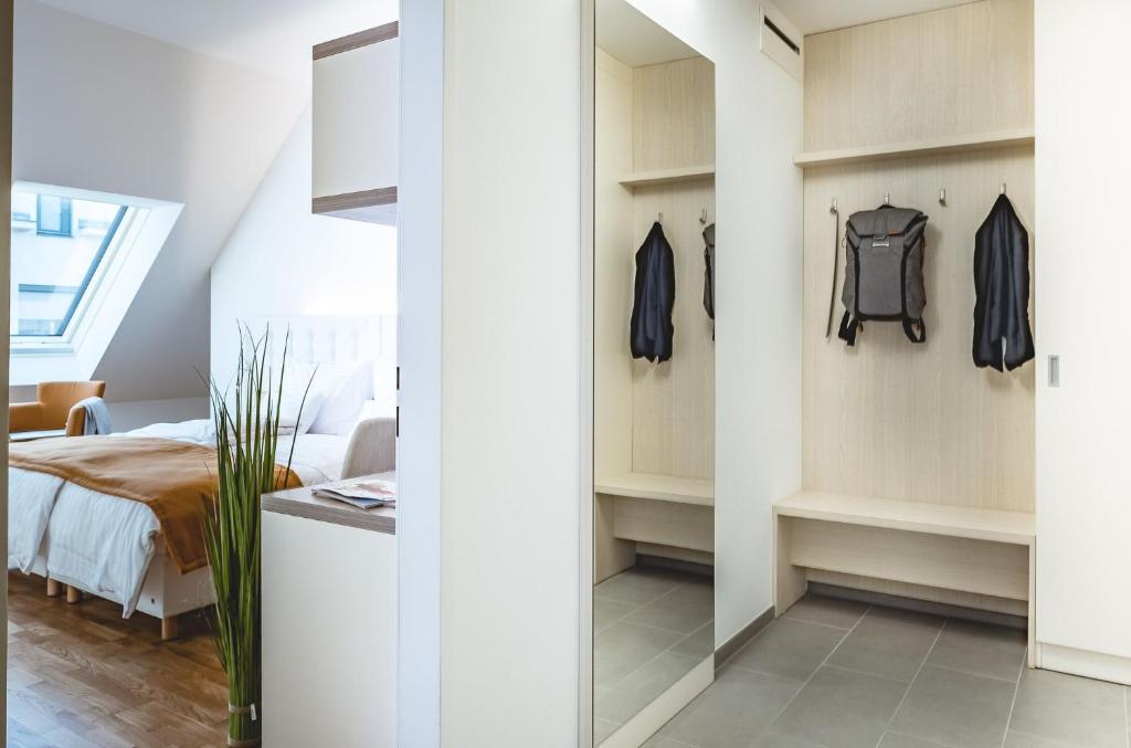 Postel nebo postele na pokoji v ubytování Oliver Apartments | contactless check-in