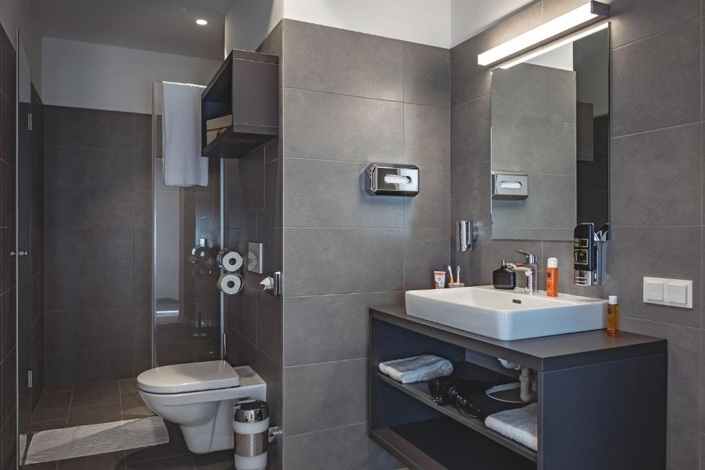 Koupelna v ubytování Oliver Apartments | contactless check-in