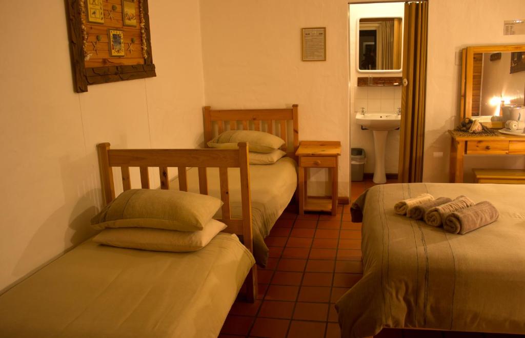 Postel nebo postele na pokoji v ubytování Bay Cove Inn