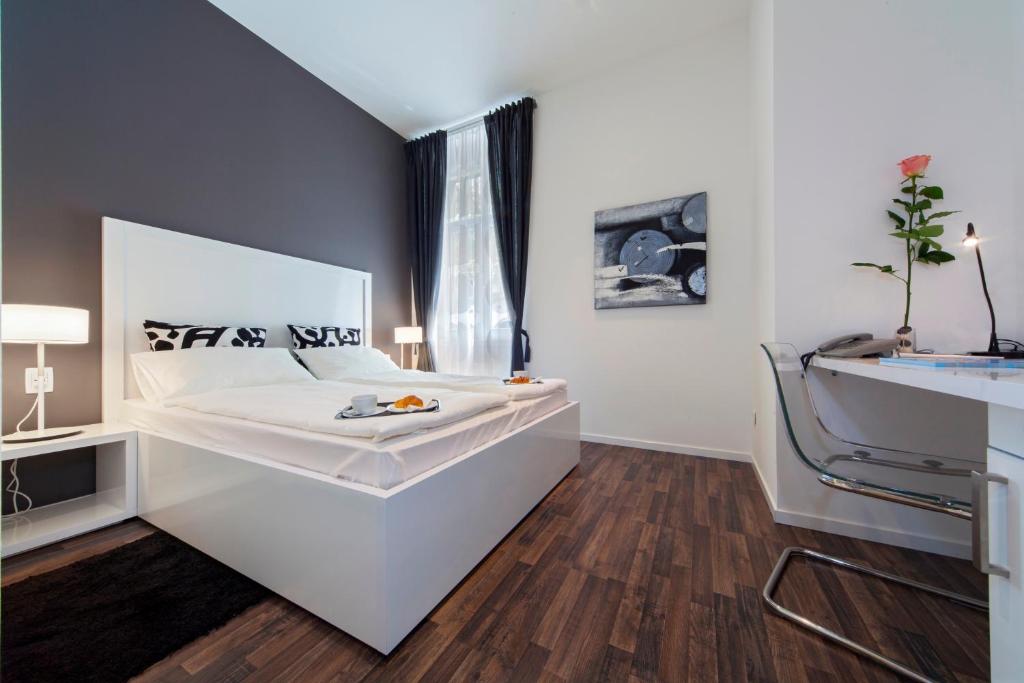 Posteľ alebo postele v izbe v ubytovaní Priuli Luxury Rooms