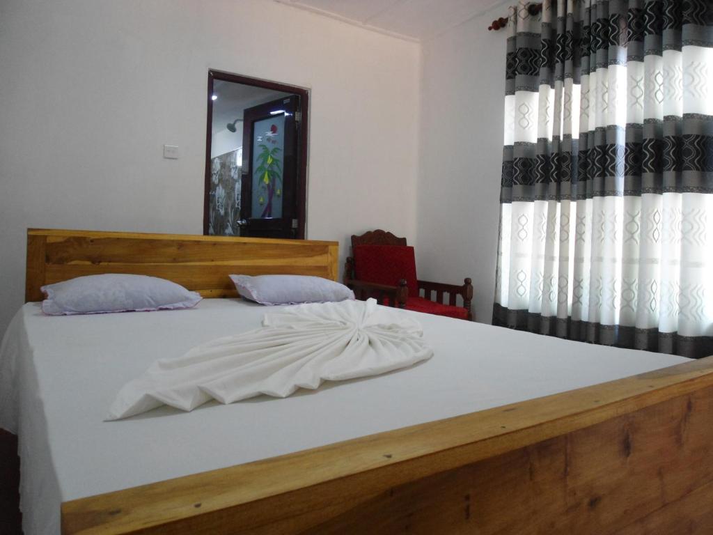 Postel nebo postele na pokoji v ubytování Villa Ravichini