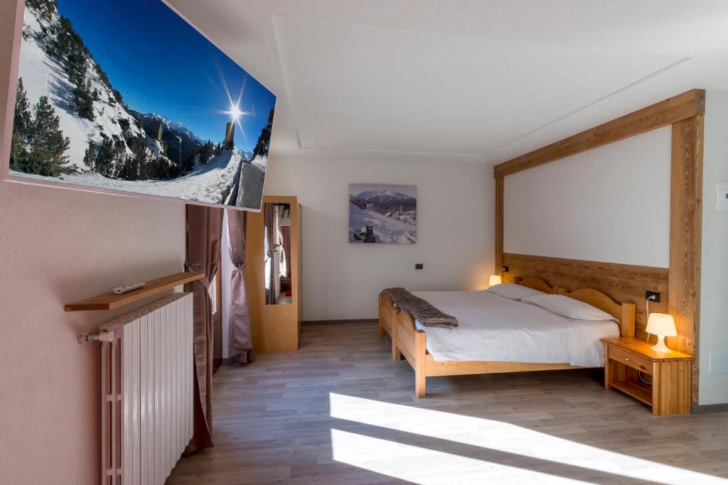 Postel nebo postele na pokoji v ubytování Hotel La Val