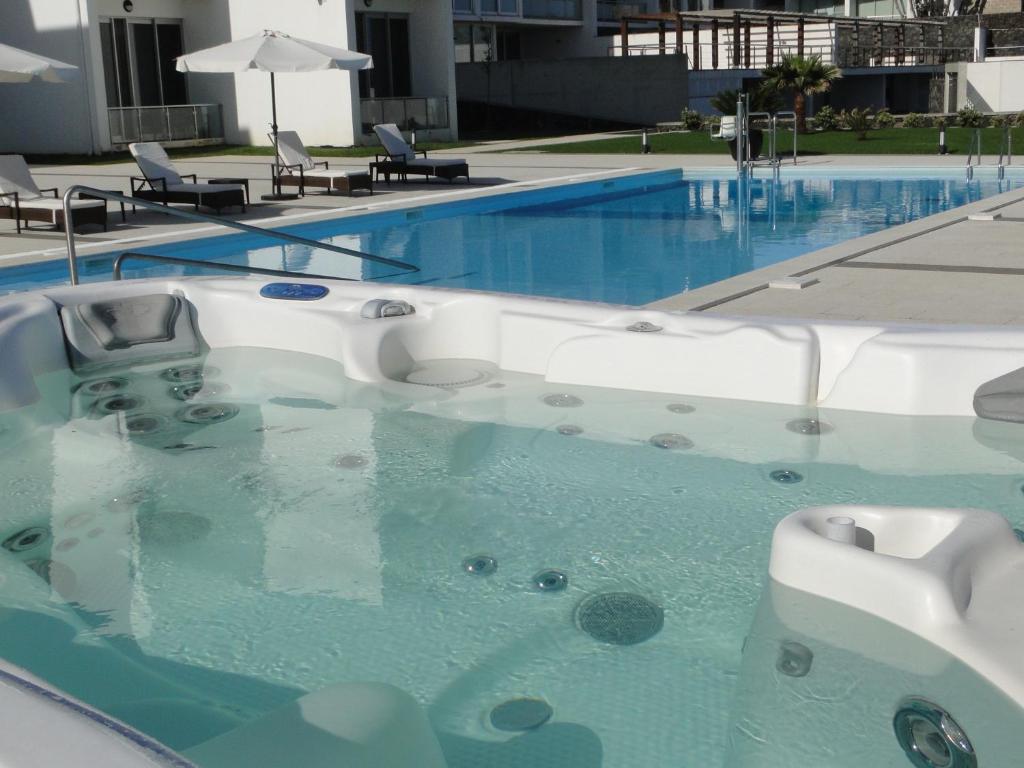 Bazén v ubytování Atlantida Mar Hotel nebo v jeho okolí