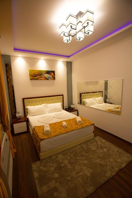 Postel nebo postele na pokoji v ubytování Hotel Palma