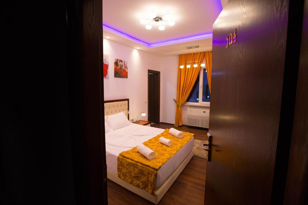 Postel nebo postele na pokoji v ubytování Hotel Palma