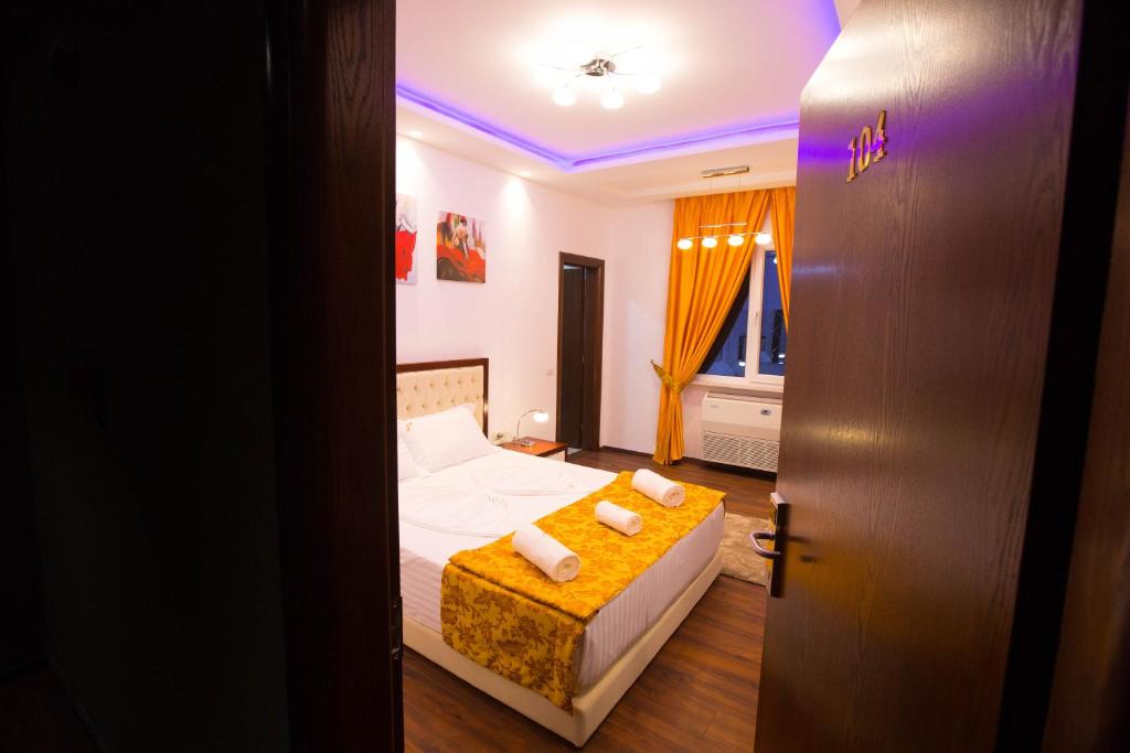 Postel nebo postele na pokoji v ubytování Hotel Palma