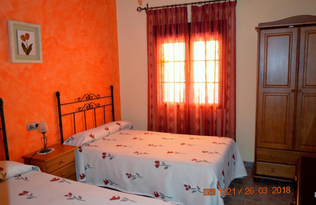 Postel nebo postele na pokoji v ubytování Posada La Reja