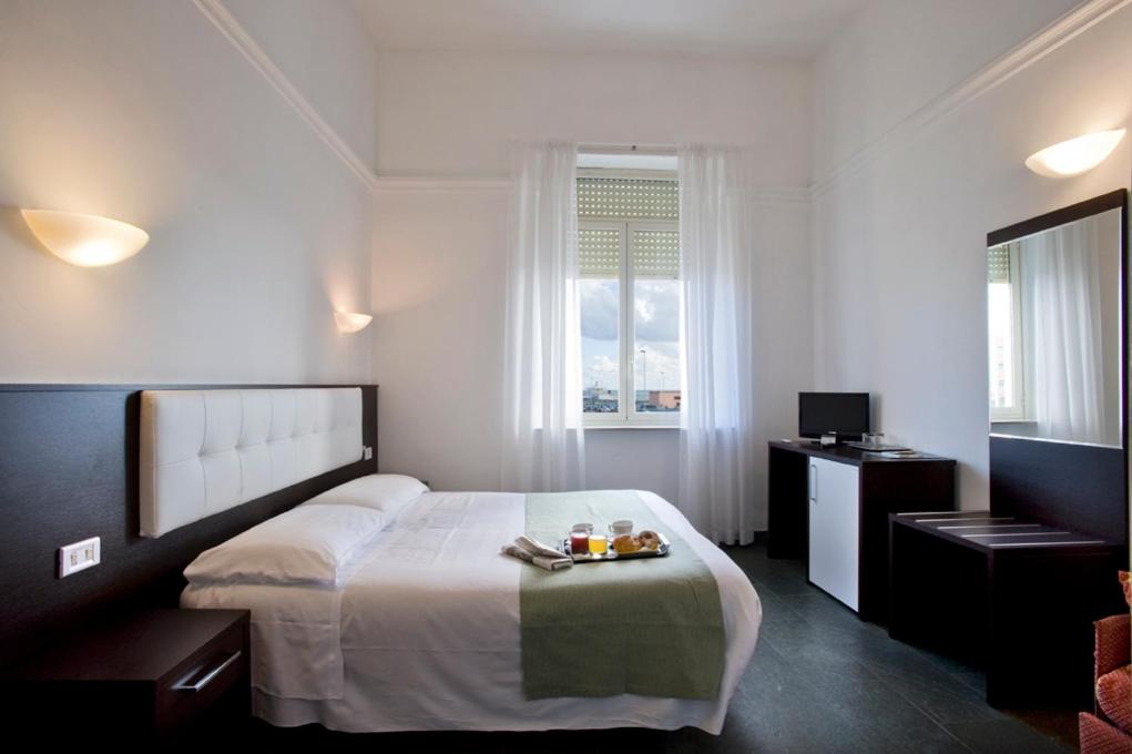 Postel nebo postele na pokoji v ubytování Dipendenza Hotel Bellavista