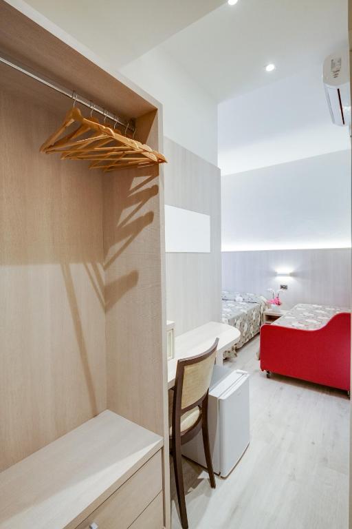 Postel nebo postele na pokoji v ubytování Hotel Barbiani