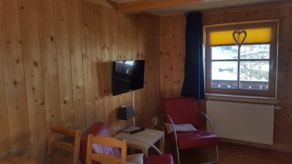 TV a/nebo společenská místnost v ubytování Fasserhof