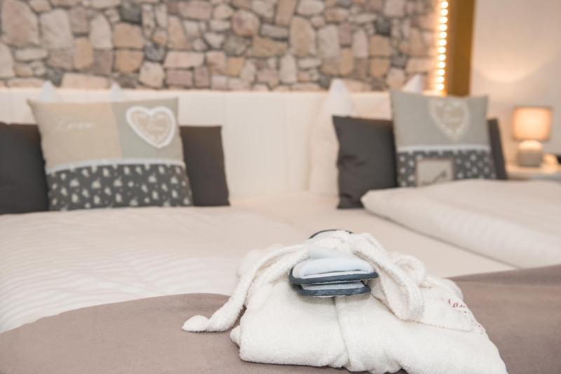 Postel nebo postele na pokoji v ubytování PIEPers Landidyll Hotel