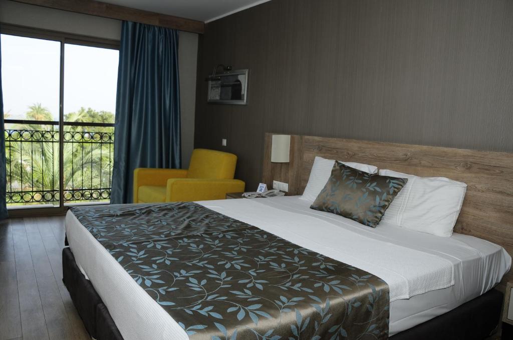 Postel nebo postele na pokoji v ubytování Lucida Beach Hotel - Ultra All Inclusive