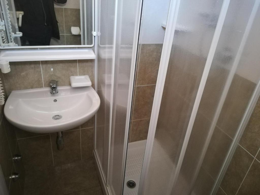 Koupelna v ubytování Hotel Astoria