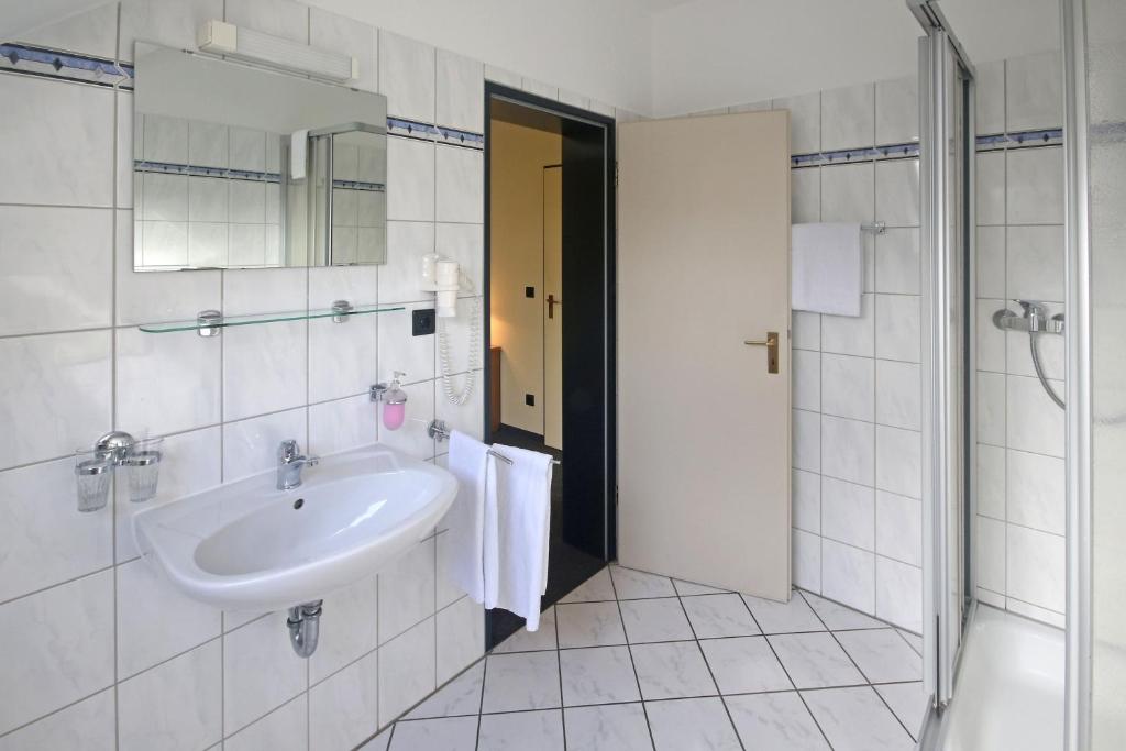 Koupelna v ubytování Hotel Busch-Atter