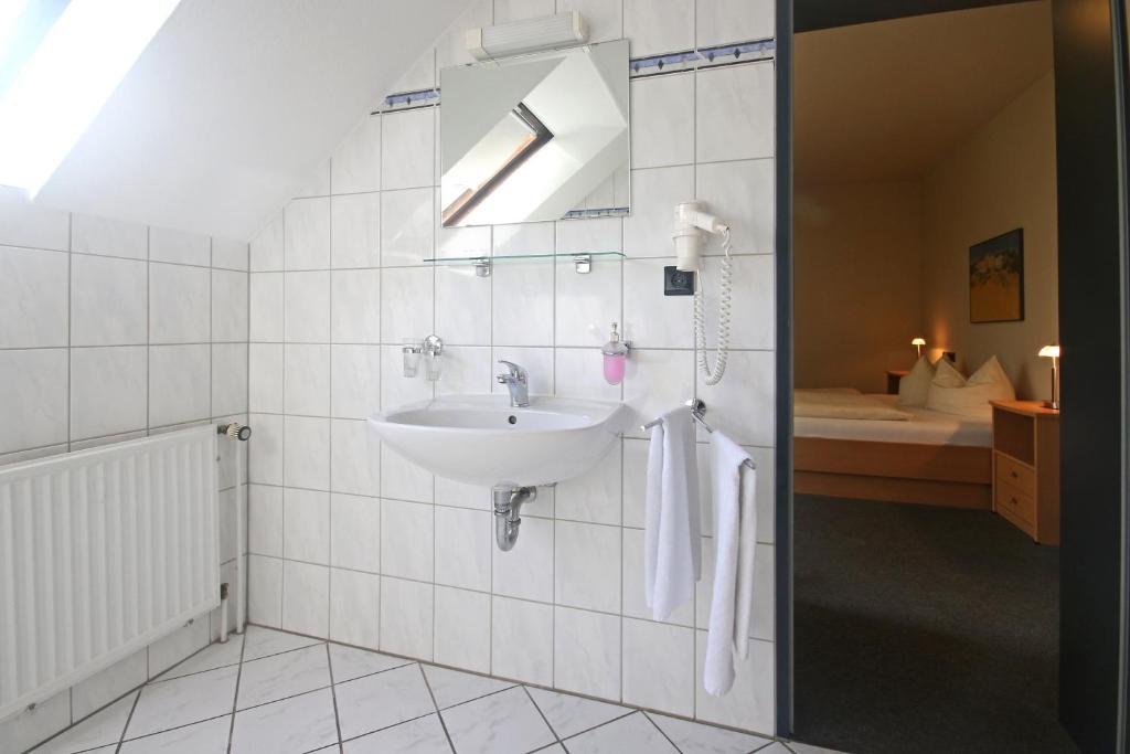 Koupelna v ubytování Hotel Busch-Atter