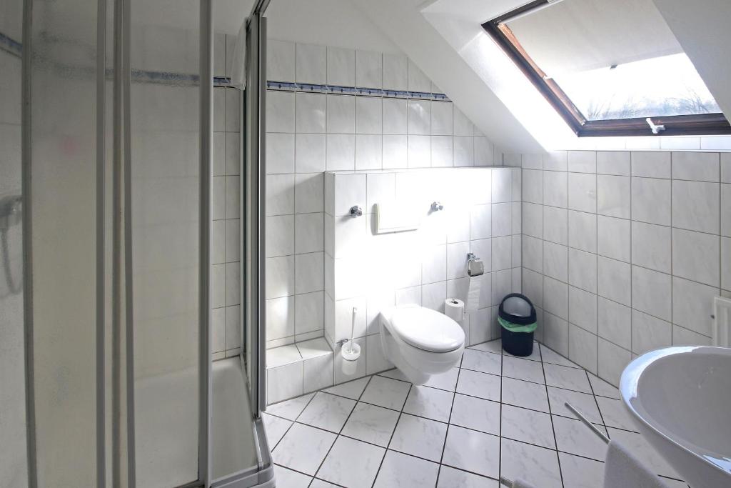 Koupelna v ubytování Hotel Busch-Atter