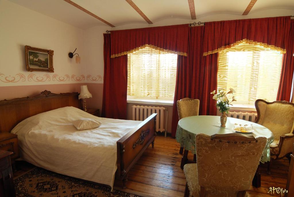 Postel nebo postele na pokoji v ubytování Cantervilla Castle