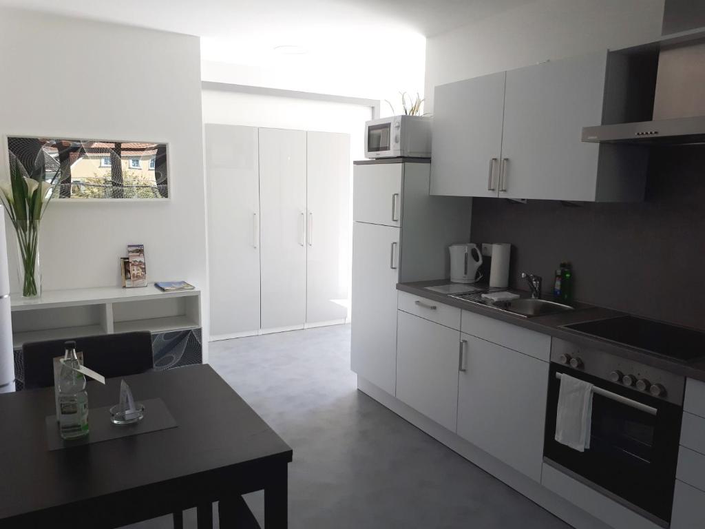Kuchyň nebo kuchyňský kout v ubytování Bugenhagen - Classic Appartements