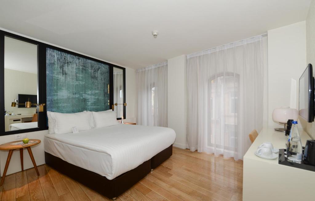 Кровать или кровати в номере Miapera Hotel and Spa