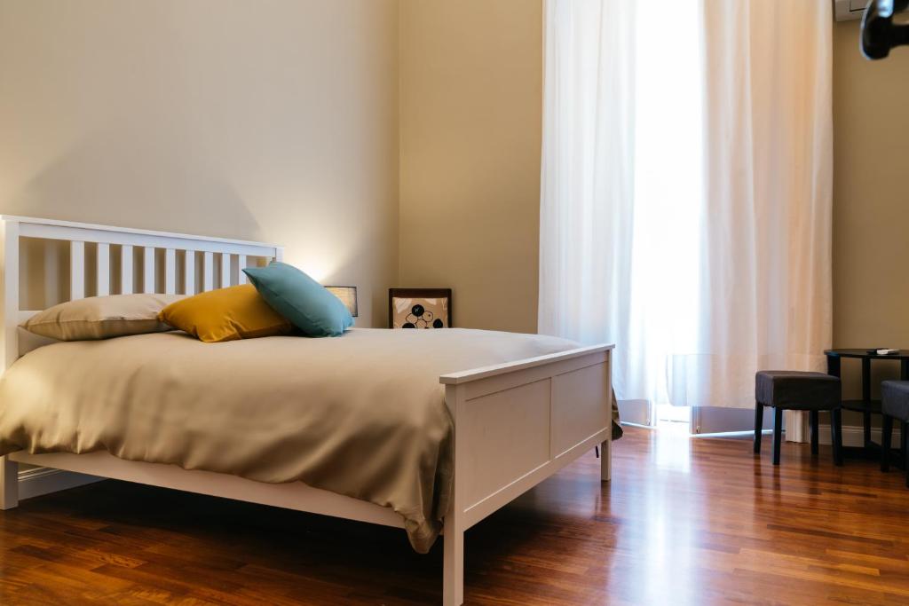Postel nebo postele na pokoji v ubytování b&b le 4 leggende