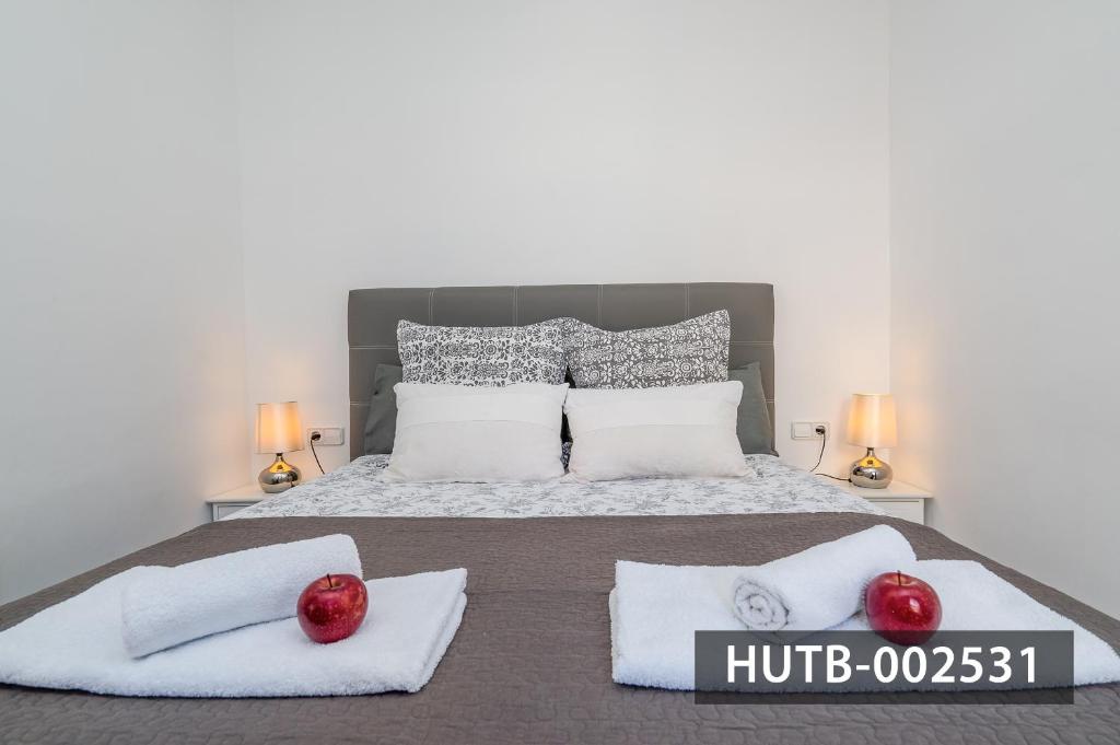 Postel nebo postele na pokoji v ubytování Elegantniy Poble Sec
