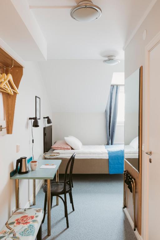 Postel nebo postele na pokoji v ubytování 2Home Hotel Gävle