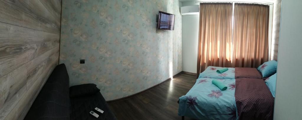 TV a/nebo společenská místnost v ubytování Hostel Voyage
