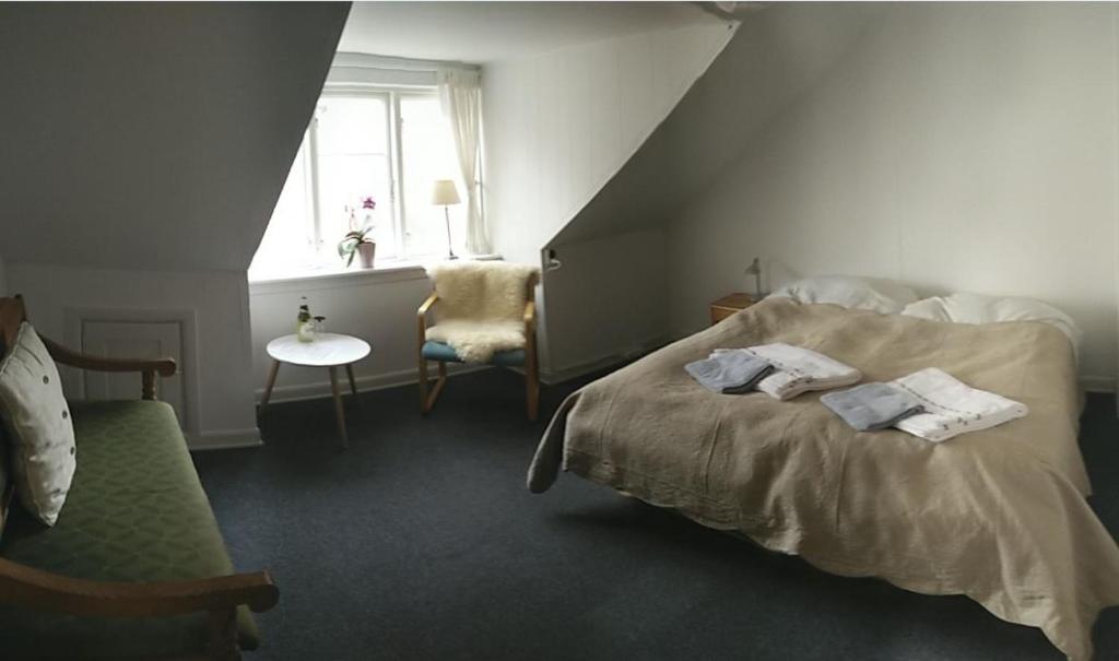 Postel nebo postele na pokoji v ubytování Dagmar B&B