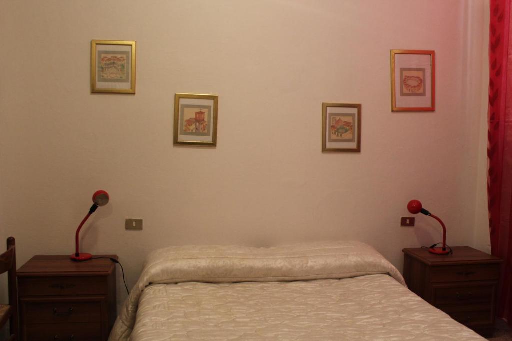 A bed or beds in a room at Il Capriolo