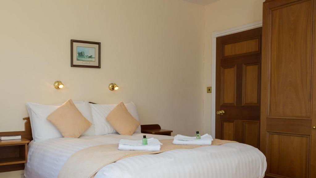 Postel nebo postele na pokoji v ubytování Bethel Guesthouse