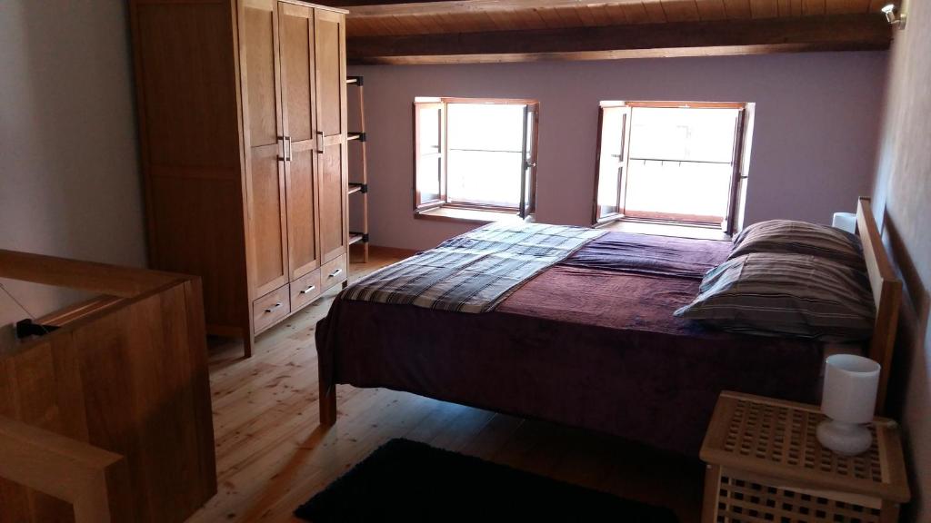 Postel nebo postele na pokoji v ubytování Fortica house