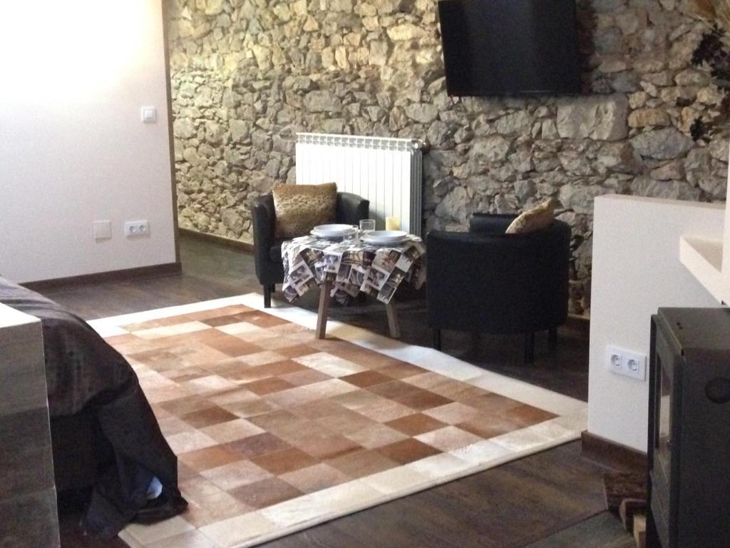 Televízia a/alebo spoločenská miestnosť v ubytovaní Estudio Sonido y Jacuzzi
