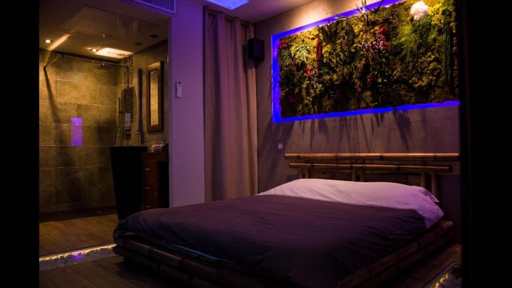 Postel nebo postele na pokoji v ubytování B&B Villa sensorielle