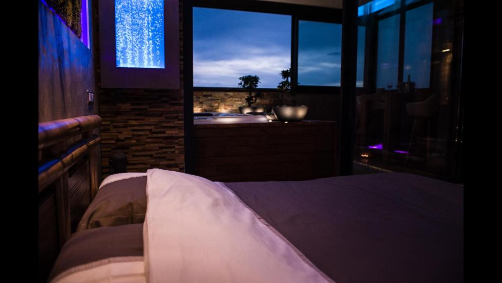 Postel nebo postele na pokoji v ubytování B&B Villa sensorielle