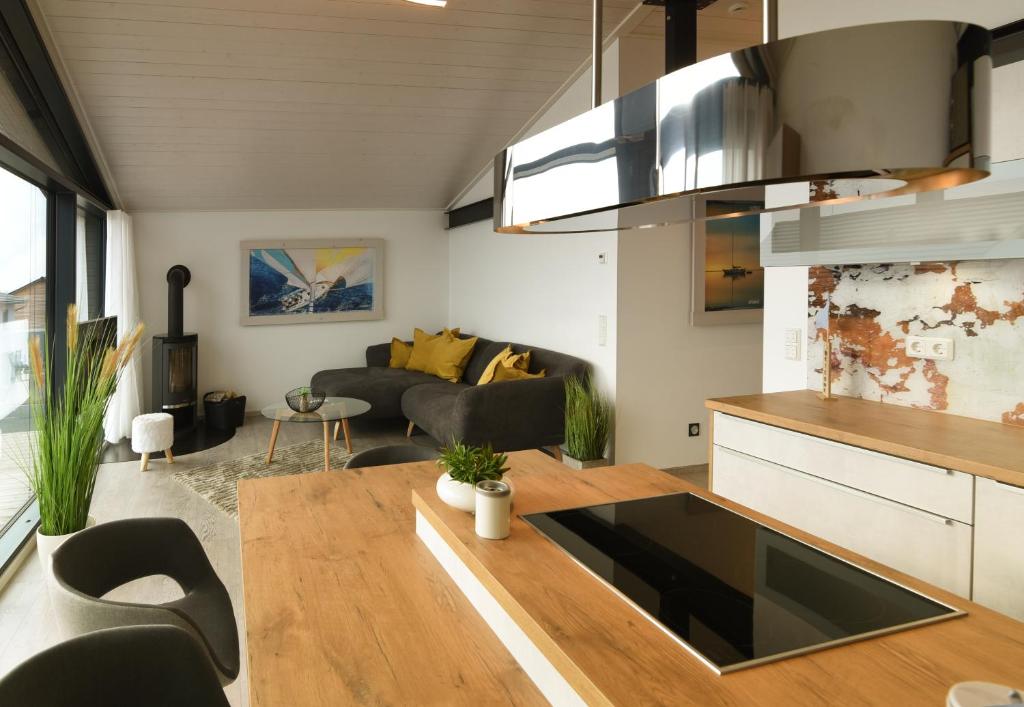 Kuchyň nebo kuchyňský kout v ubytování PETIT-CHALET AM HAINER SEE