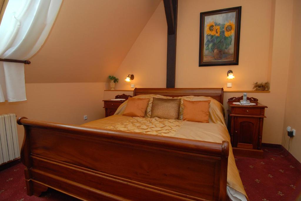 Postel nebo postele na pokoji v ubytování Hotel Opera