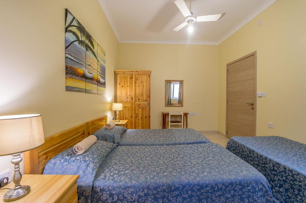 Postel nebo postele na pokoji v ubytování Electra Guesthouse