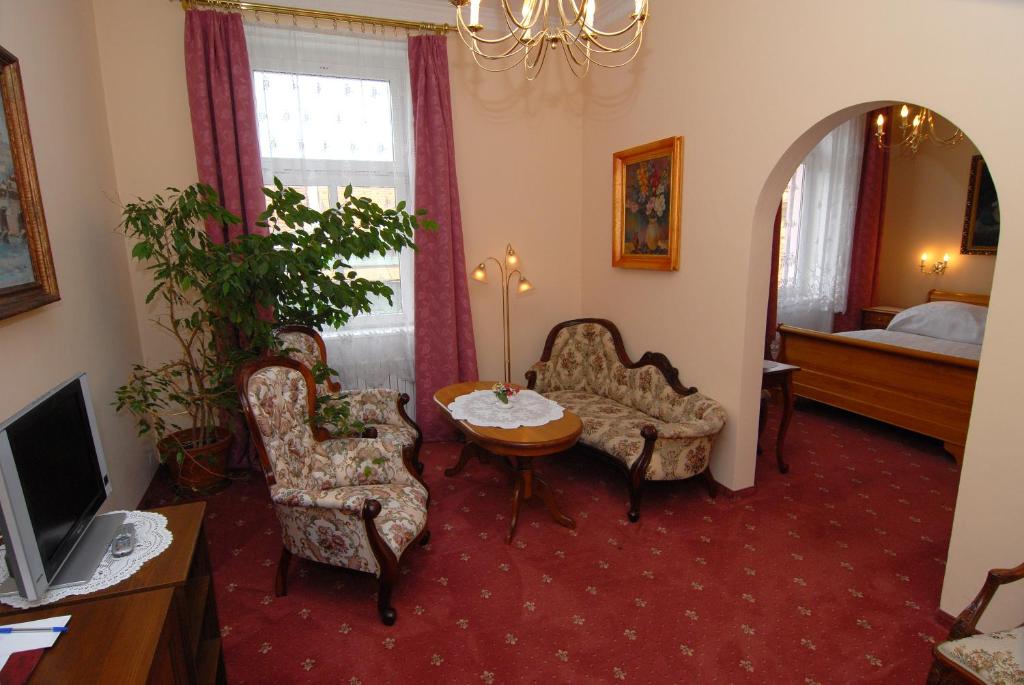 TV a/nebo společenská místnost v ubytování Hotel Opera