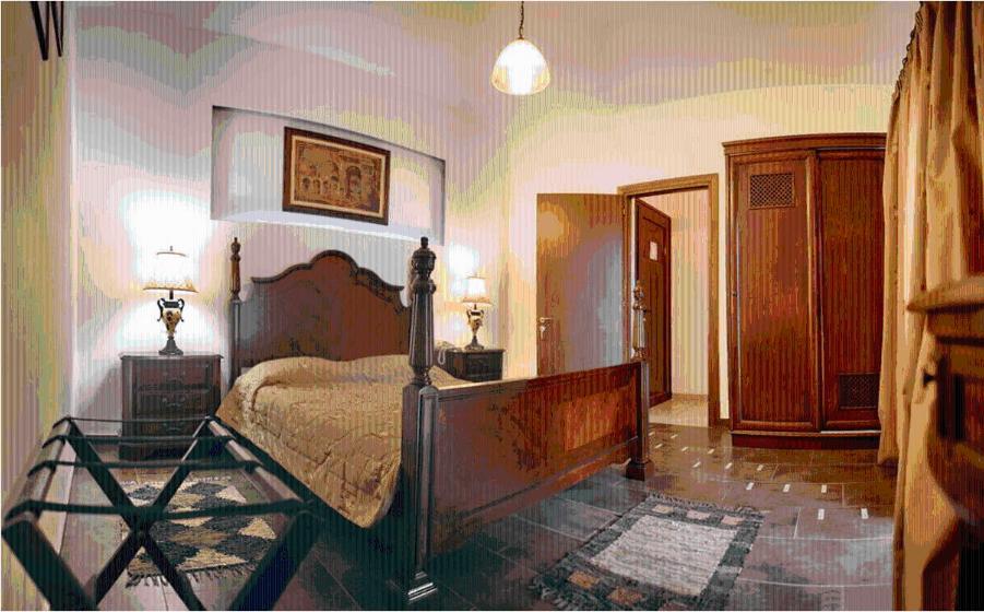Postel nebo postele na pokoji v ubytování Malemi Organic Hotel