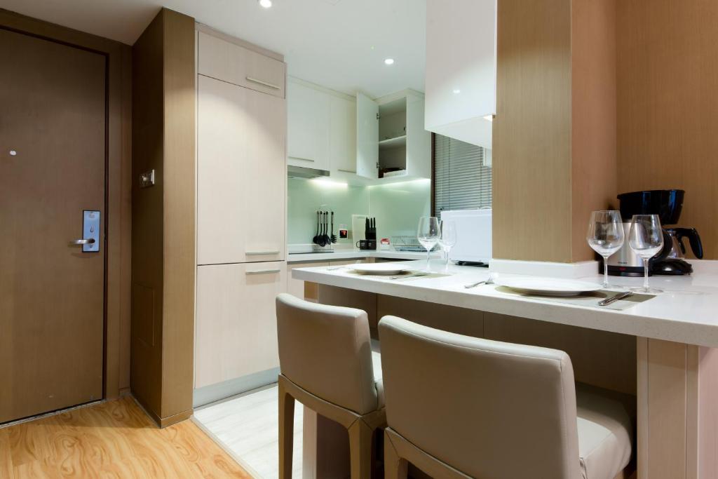 Kuchyň nebo kuchyňský kout v ubytování Savills Residence Daxin Shenzhen Bay