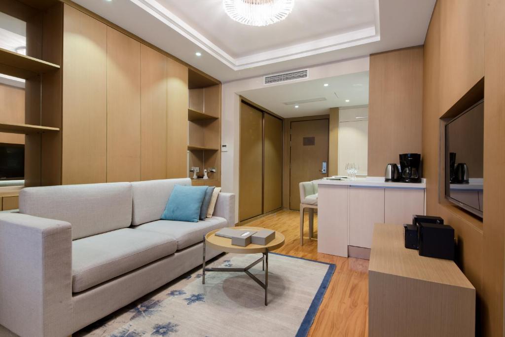 TV a/nebo společenská místnost v ubytování Savills Residence Daxin Shenzhen Bay