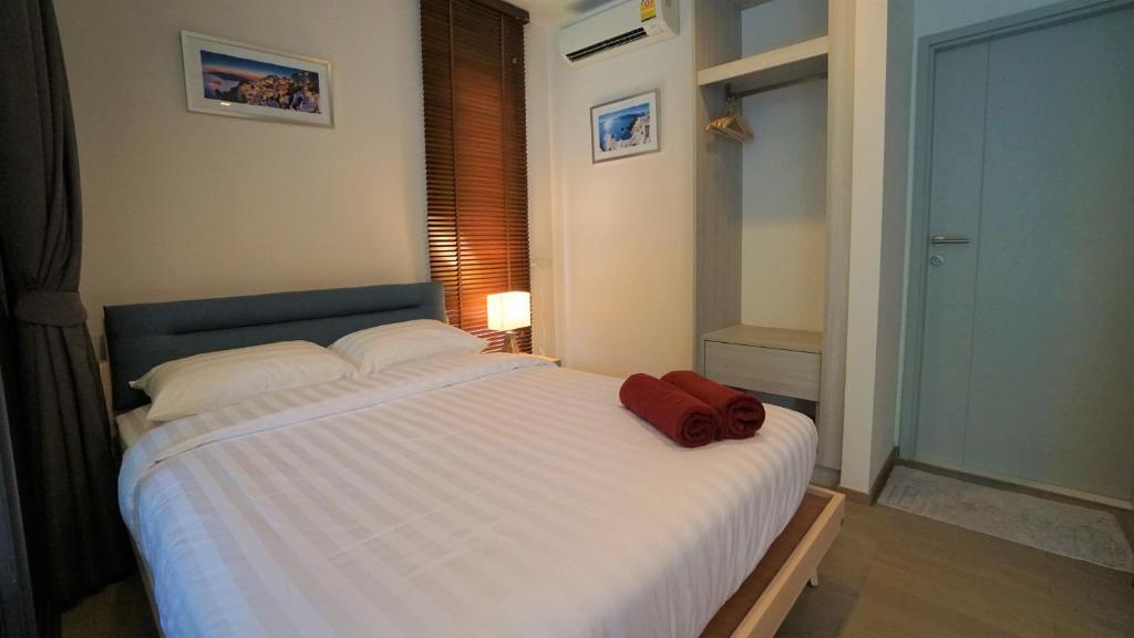Postel nebo postele na pokoji v ubytování 23° Khao Yai