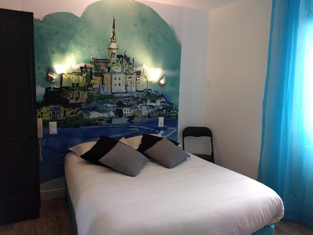 Postel nebo postele na pokoji v ubytování Hôtel Patton