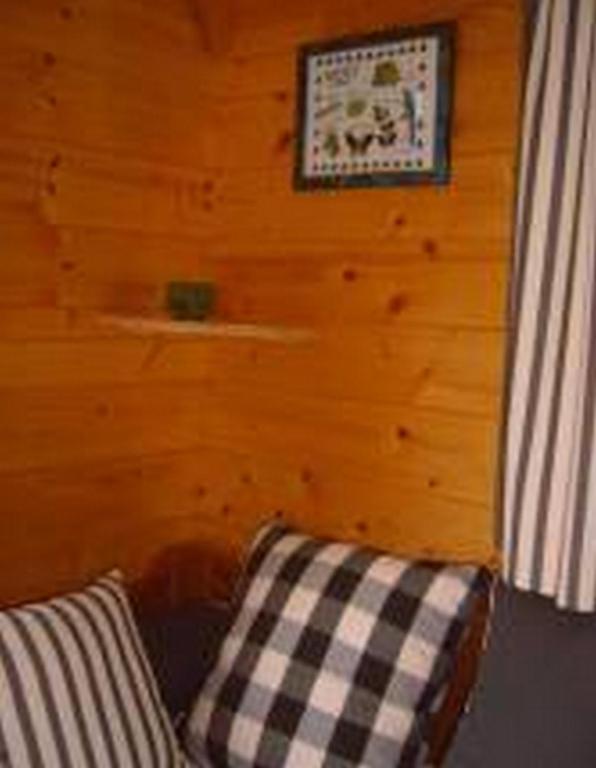 Postel nebo postele na pokoji v ubytování Les Roulottes de Maufront